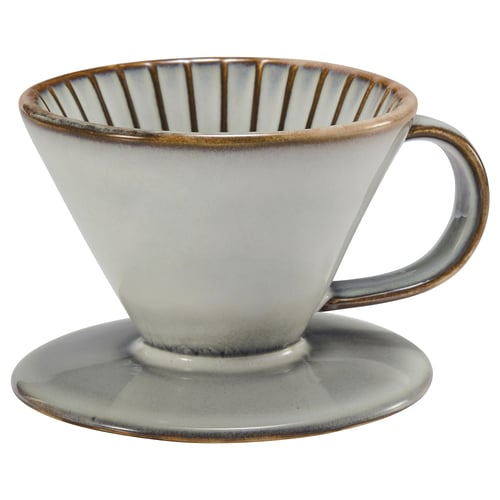 A white ceramic coffee dripper, part of the GLADELIG series. It a handle and is designed to brew coffee.