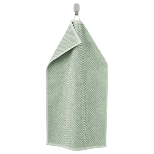 A beige GULVIAL towel hanging, made of soft cotton, rectangular with a textured design.