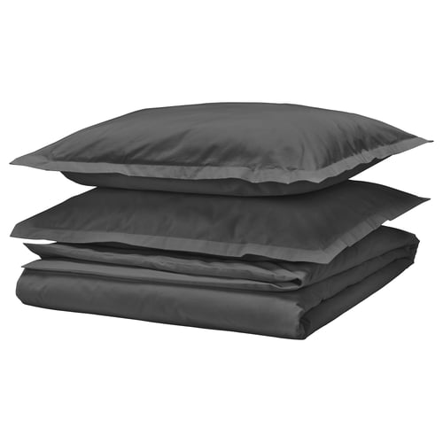 Dark grey HAMPFLOCKEL bed set, smooth cotton, folded neatly, with envelope pillowcases.