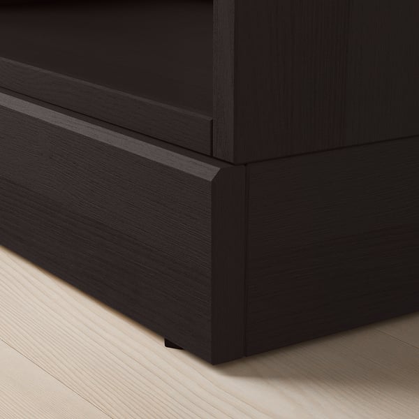 Dark wood shelving unit corner showcasing smooth, polished finish and sturdy build.