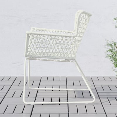 White outdoor chair with woven seat and back, ideal for gardens or balconies, offering comfort with armrests and flexible rattan.