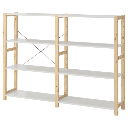 An IVAR storage unit in white with wooden posts. It four shelves and a sturdy design.