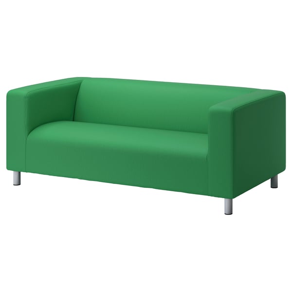Modern green sofa with metal legs, rectangular shape, clean lines, removable cover.