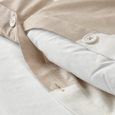 KLYNNETÅG غطاء لحاف و غطاء مخدة, بيج/ابيض/منقط., 150x200/50x80 سم