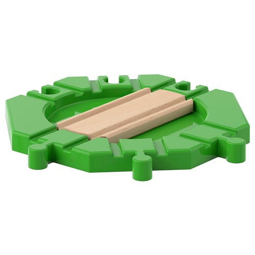 Green plastic and wooden train track turntable. Interlocking design, ideal for changing train direction.