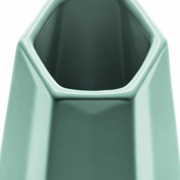 Close-up of stylish mint green vase, smooth surface & unique shape.