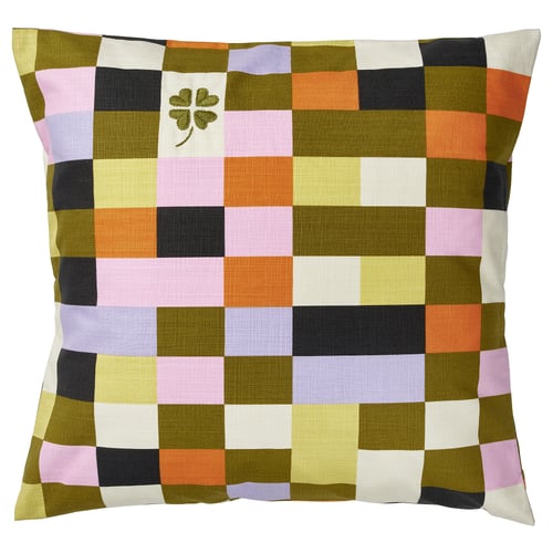 Square MÄVINN cushion with multi-color check and hand-embroidered green clover.