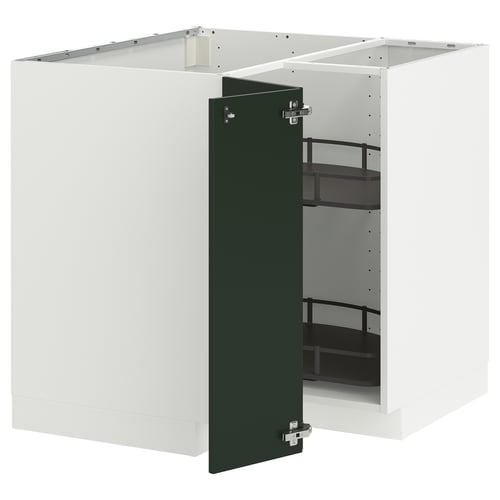 A white METOD kitchen cabinet with a green door and adjustable shelves.