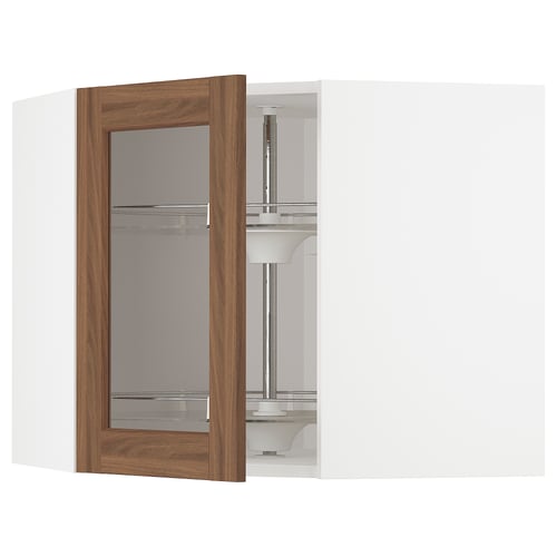 A white METOD kitchen cabinet with an open walnut-finished glass door and an interior carousel.