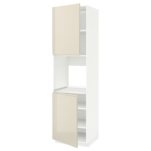 A white and beige METOD kitchen cabinet with adjustable shelves and high gloss doors.