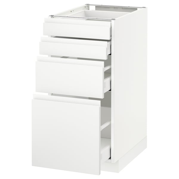 White METOD kitchen unit with modern, minimalist design and three open drawers.