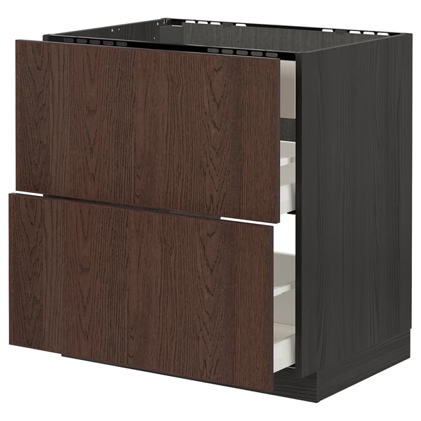 Brown ikea METOD kitchen unit with wooden drawers.