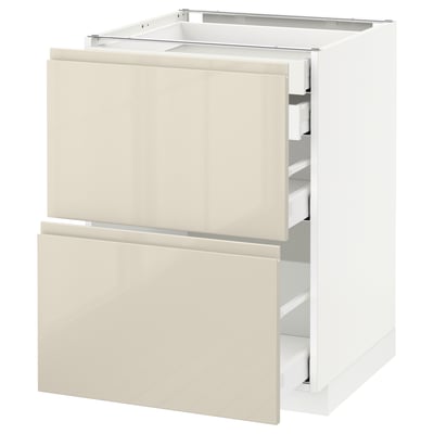 IKEA METOD kitchen unit with beige gloss drawers and white base, modern minimalist design.