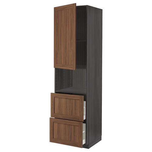 Ikea METOD kitchen unit in walnut finish with two open drawers and an open cabinet.