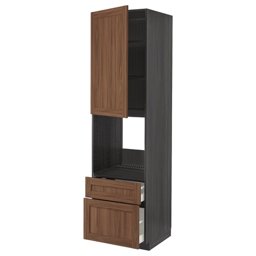 Walnut-colored kitchen cabinet with wooden drawers and shelves. Tall, sleek, dark grey unit with adjustables.