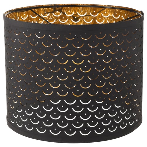 NYMÖ black lampshade with golden pattern, cylindrical shape.