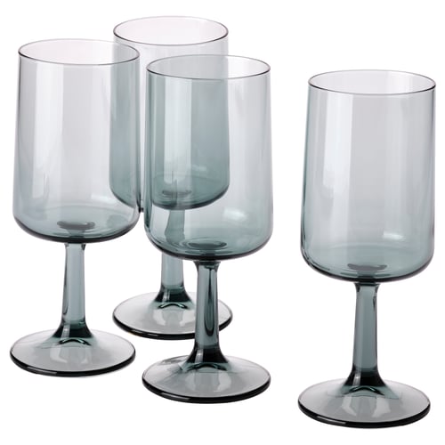 Four gray-blue OMBONAD wine glasses, elegant with thin stems and rounded tops, arranged in a neat row.