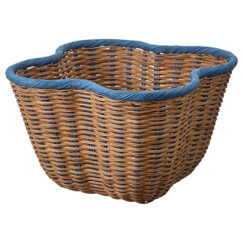 Blue-rimmed wicker basket, clover shape, natural weave, rustic design.