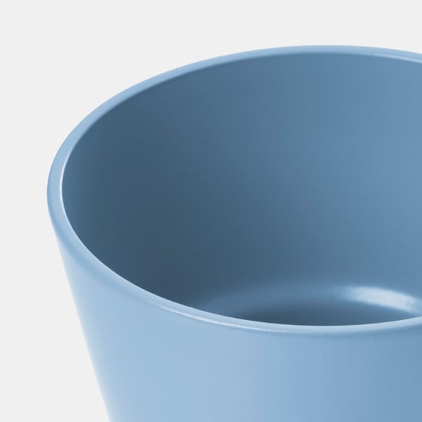 Close-up of light blue, smooth, matte plant pots interior. Quality lacquer finish, perfect for waterproofing.
