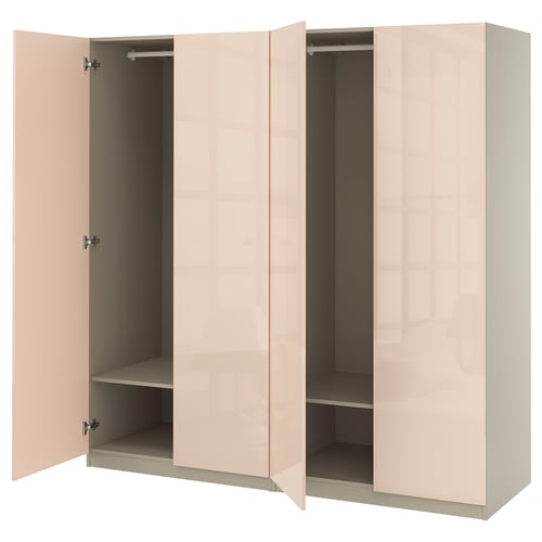 A light pink PAX wardrobe with three open sections for storing clothes and accessories.