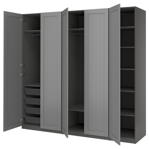Grey PAX wardrobe with open doors, featuring shelves and drawers, made of particleboard and fiberboard.