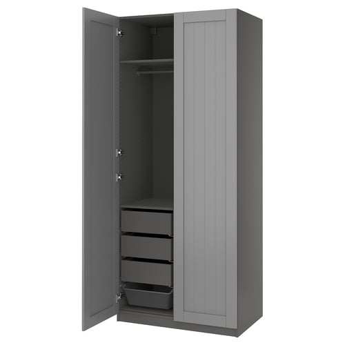 An open PAX wardrobe in grey. It drawers, a shelf, and a hanging rod, highlighting its storage versatility.