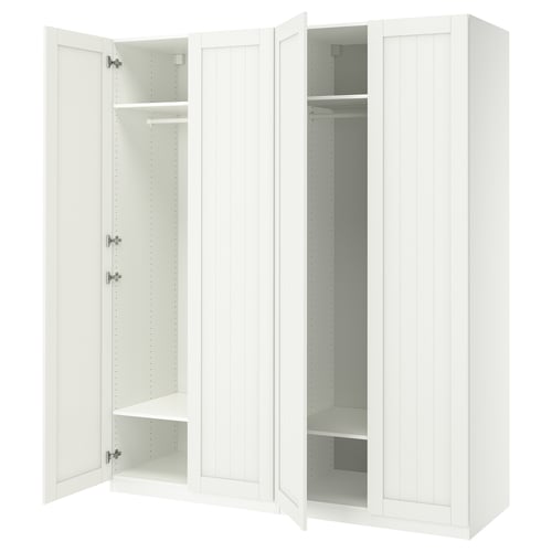 White PAX wardrobe. 2 doors open revealing shelves and rail. Minimalist, clean design.