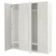White PAX wardrobe with textured doors, soft close hinges, and adjustable shelves.