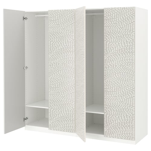 White PAX wardrobe with wavy pattern, three sections, open doors revealing shelves, and soft-close hinges.