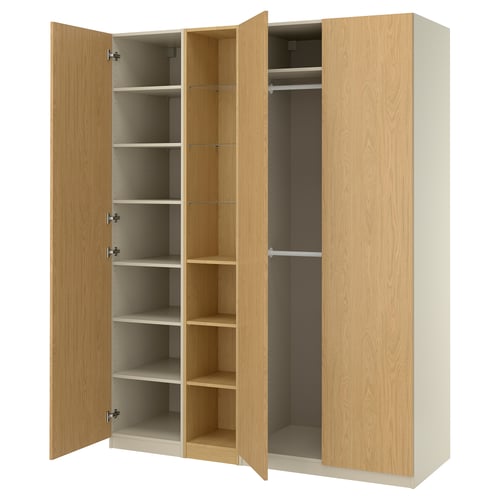 Wooden PAX wardrobe shown open, light oak, rectangular, four large doors, multiple shelves and hanging space.