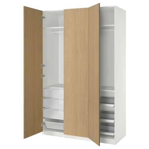 An open white and oak PAX wardrobe with shelves, drawers, and a trouser hanger.