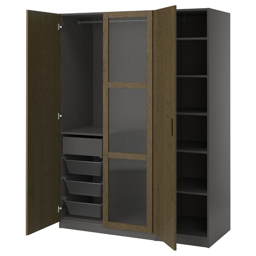 An open wooden PAX wardrobe with dark interiors, mesh baskets, and shelves.