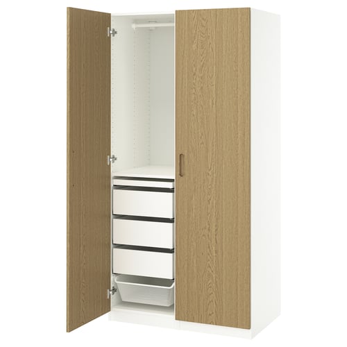 A white and oak PAX wardrobe with drawers and shelves.