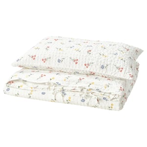 White PILDVÄRGMAL duvet set, floral print, seersucker texture, soft cotton blend, rectangular with envelope closure.