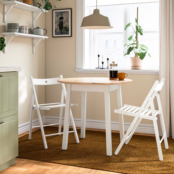 PINNTORP / FRÖSVI Table and 2 folding chairs, light brown stained white stained/pine white, 85 cm