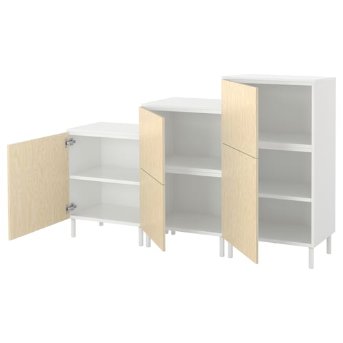 Three PLATSA storage units with wood doors, varied heights, multiple shelves, and white legs.