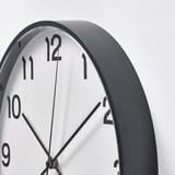PLUTTIS Wall clock, black, 28 cm