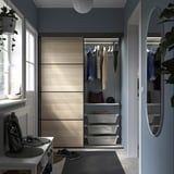 SKYTTA / BOAXEL Reach-in wardrobe with sliding door, black double sided/Mehamn white stained oak effect, 152x65x205 cm