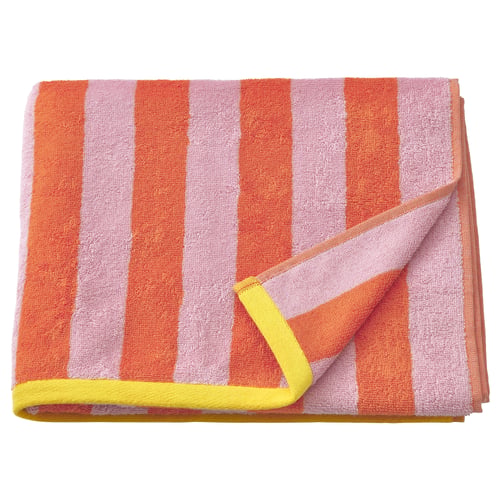 Bright pink and orange striped towel with yellow trim, folded neatly.