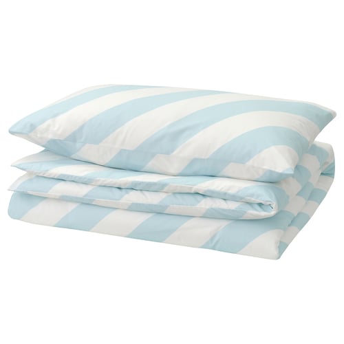 A light blue and white striped bedding set neatly folded; a classic chequered pattern.