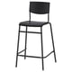 A black STIG bar stool with a metal frame and plastic seat/back, suitable for counter or kitchen island use.