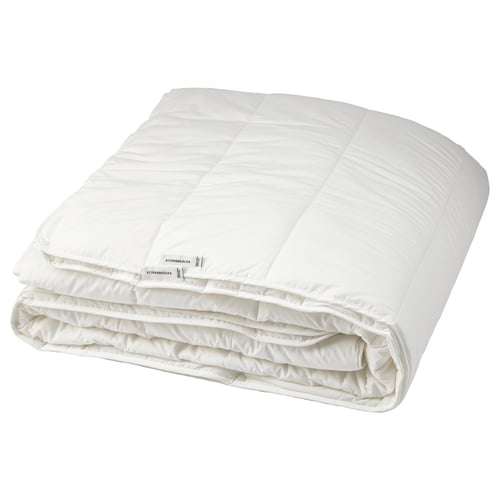 A white STJÄRNBRÄCKA duvet, made of cotton and lyocell, folded neatly. It has a soft, padded appearance with a smooth, quilted design.