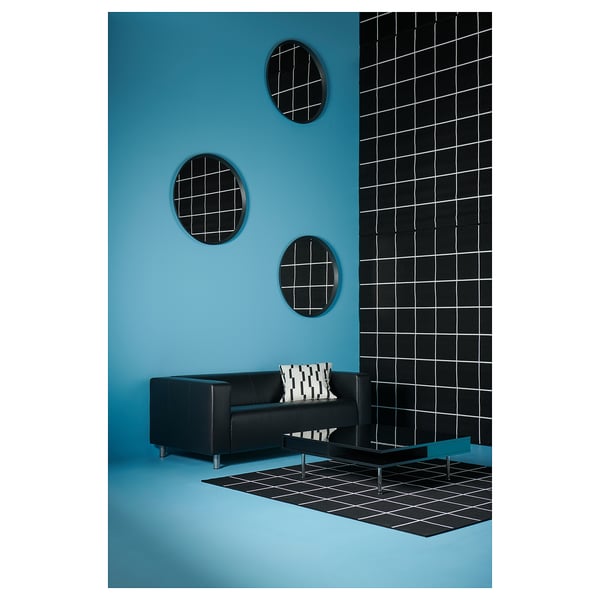Black and white square-patterned rug with soft material. Suitable for indoor and outdoor use.