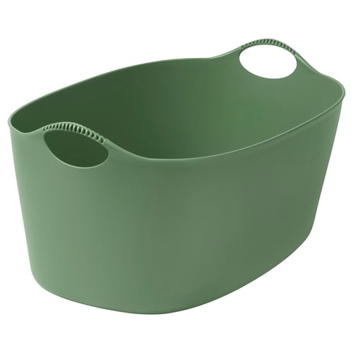 The TORKIS, a green oval laundry basket made of flexible plastic with sturdy handles for easy carrying.