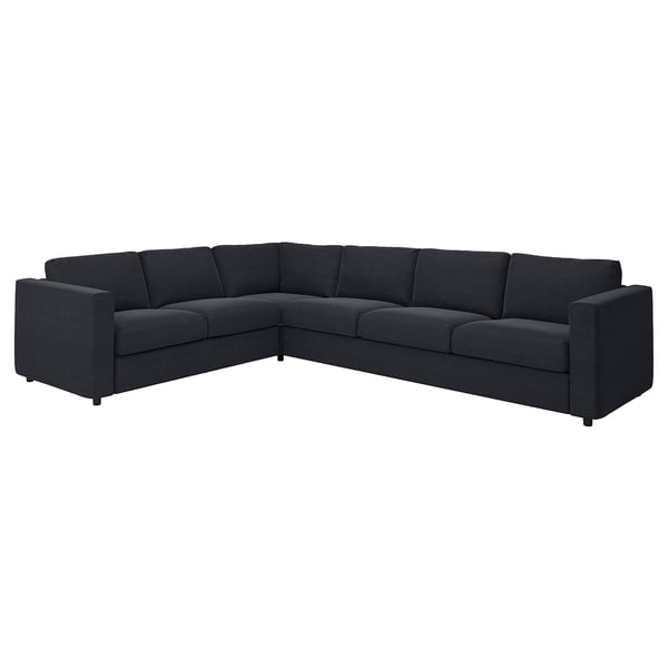 Large black l-shaped sectional sofa, modern minimalist design.