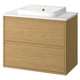 Elegant oak washstand with sleek white countertop and bowl, modern minimalist design, drawer storage.