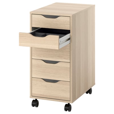 Light wooden office cabinet with three drawers, first drawer open, on black wheels.