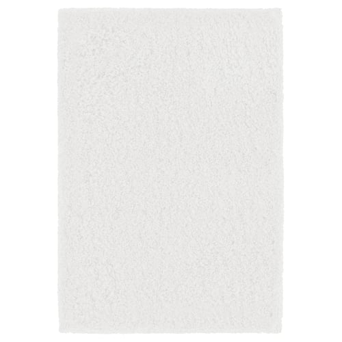 A white ALMTJÄRN bath mat. It is plush and rectangular, made from recycled polyester with a latex backing.
