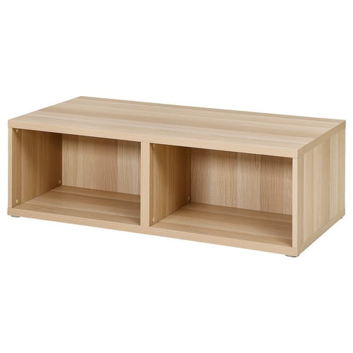 BESTÅ light brown wooden coffee table with open shelves, rectangular shape.