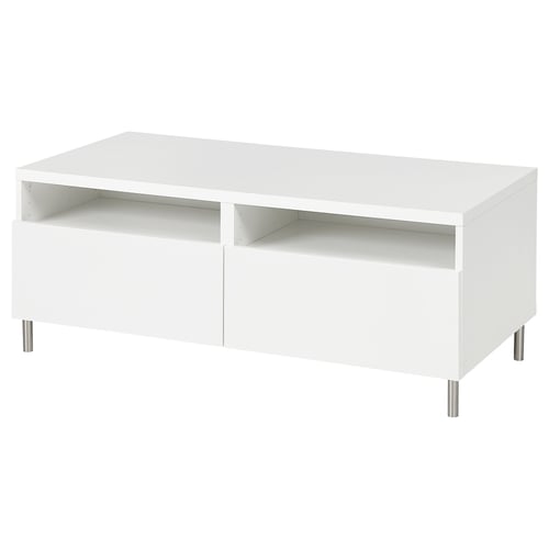 White BESTÅ modern coffee table with metal legs, open storage shelves.